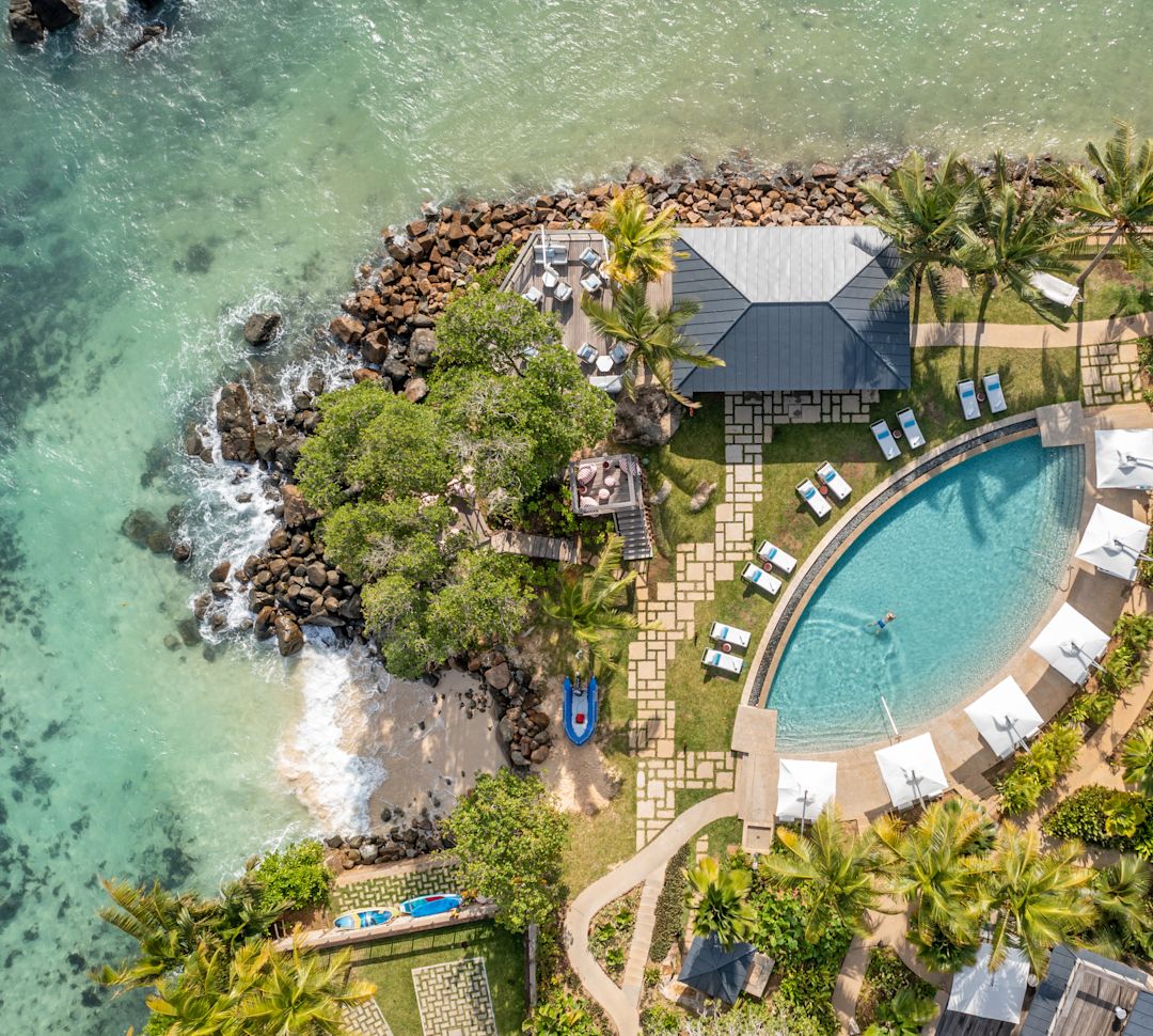 aerial view of hotel and shoreline