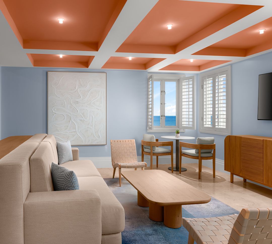 Palm Beach Lounge with a Sofa in a Sitting Area