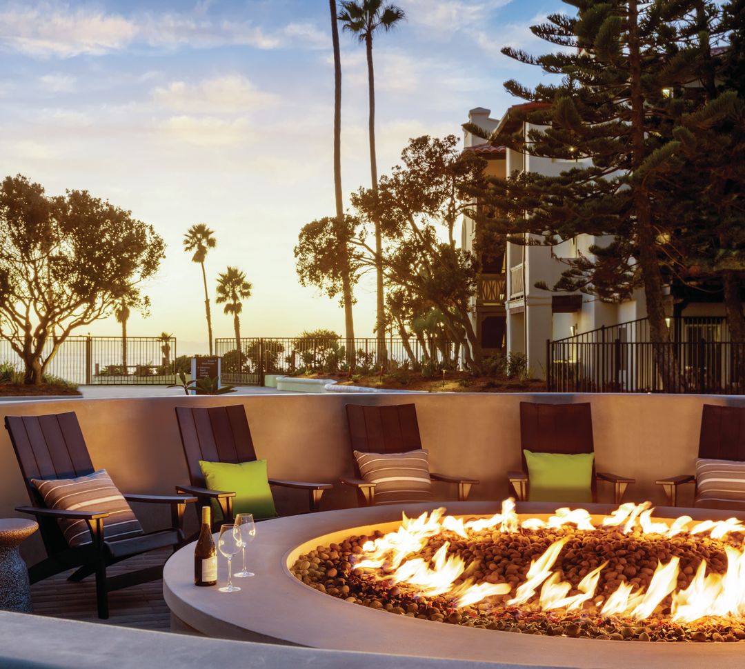 Patio Area with Seat Around a Fire Pit