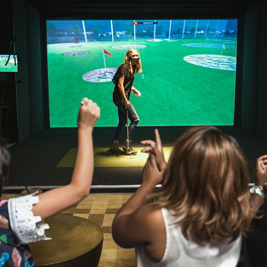 Topgolf swing suite at FastBreak, guests playing flag golf-transition