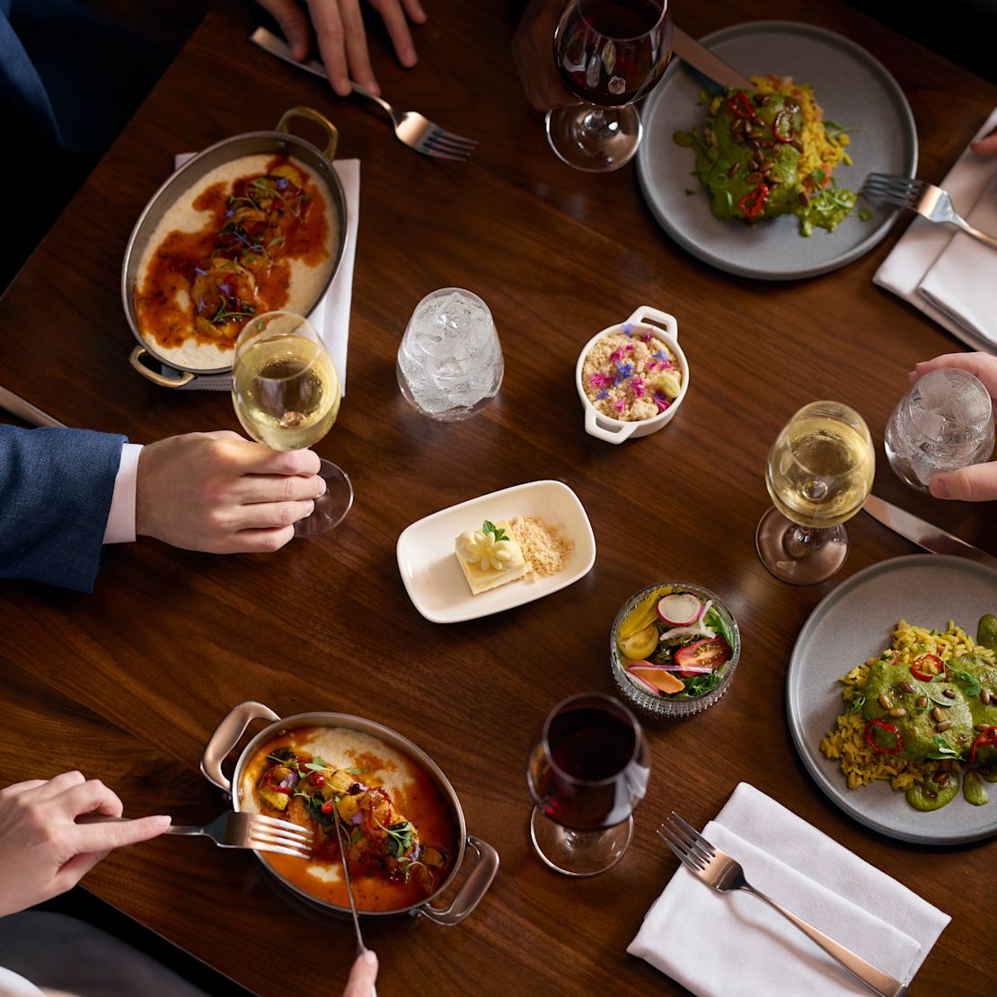 Close up of restaurant table with food and drinks-transition