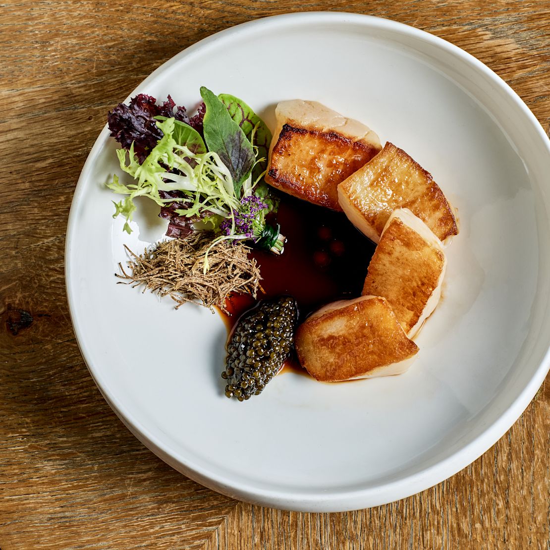 Restaurante San Laurel, vieiras e caviar