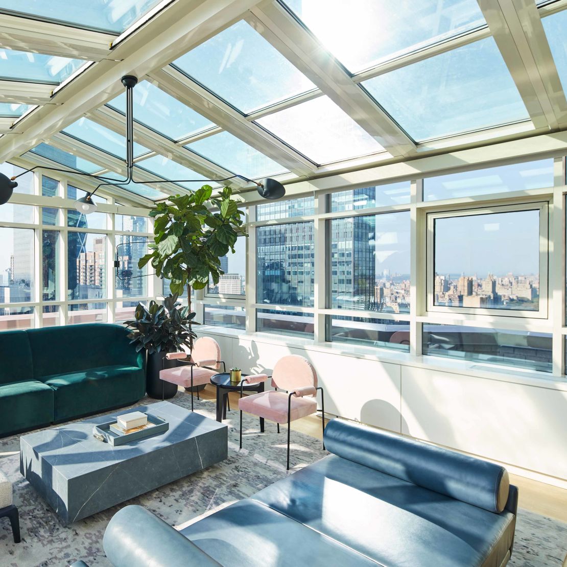 Atrium with Glass Ceiling in Guest Room with Panoramic City View-transition