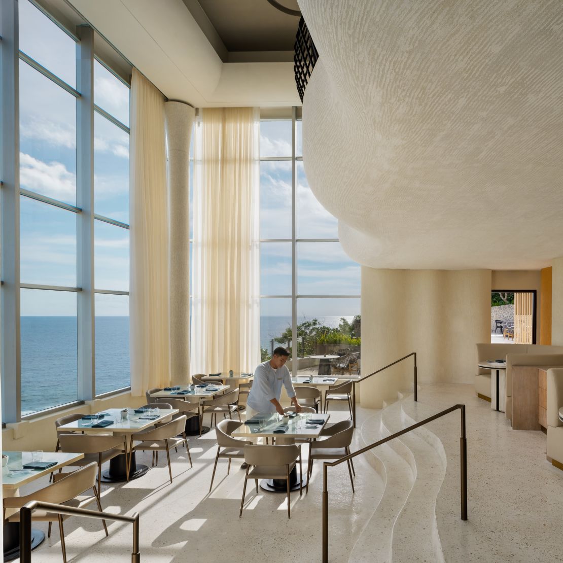 dining area with tables and chairs-transition