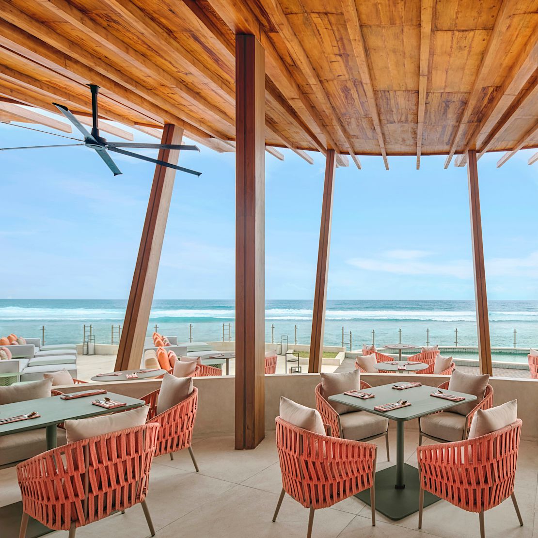 Uma Beach House Covered Exterior Dining Area with Beach View-transition