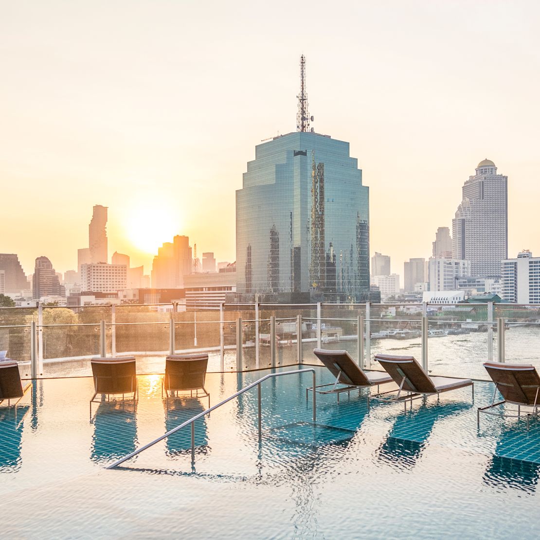 outdoor rooftop pool and city view-transition