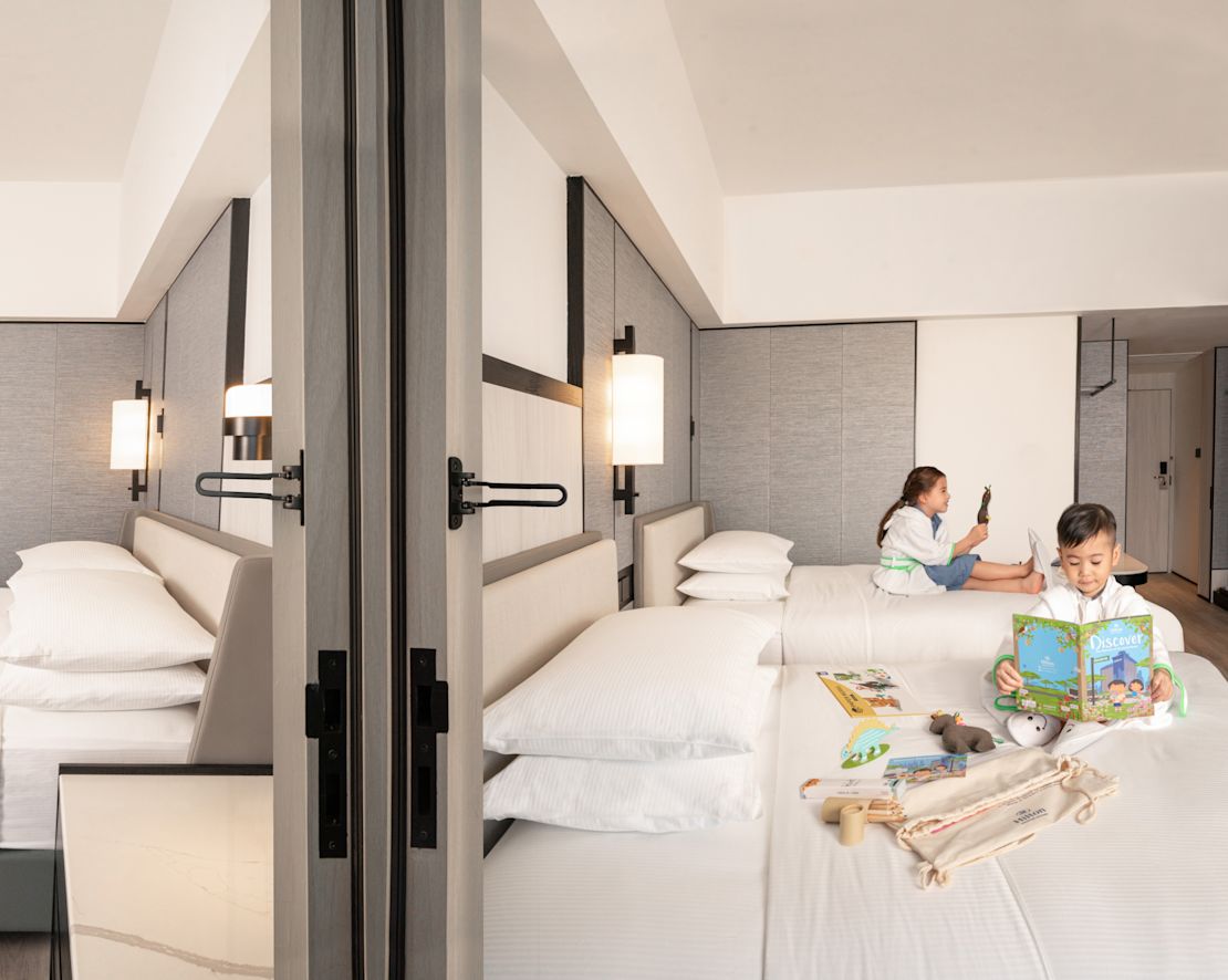 Shot of kids and parents in adjoining rooms-transition