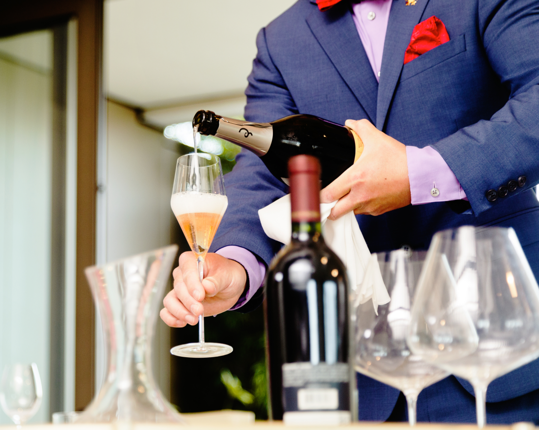 Waiter pouring champagne-transition