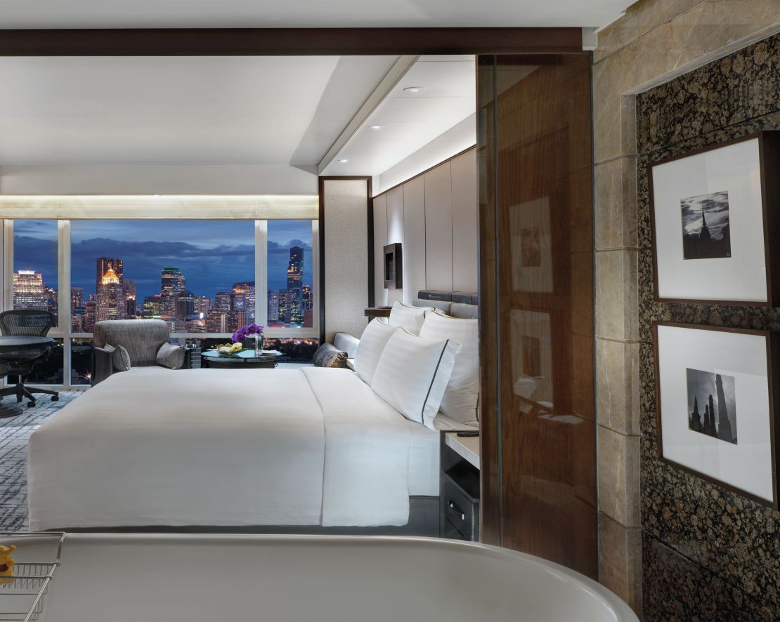 Tub, Bed,  Desk and Outside View in Executive King Room-transition