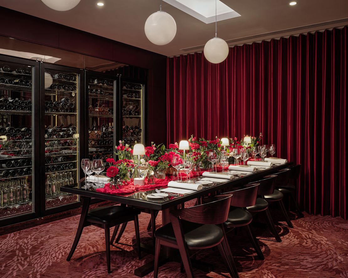 The Pem Restaurant private dining room, holiday decorated table, red flowers-transition