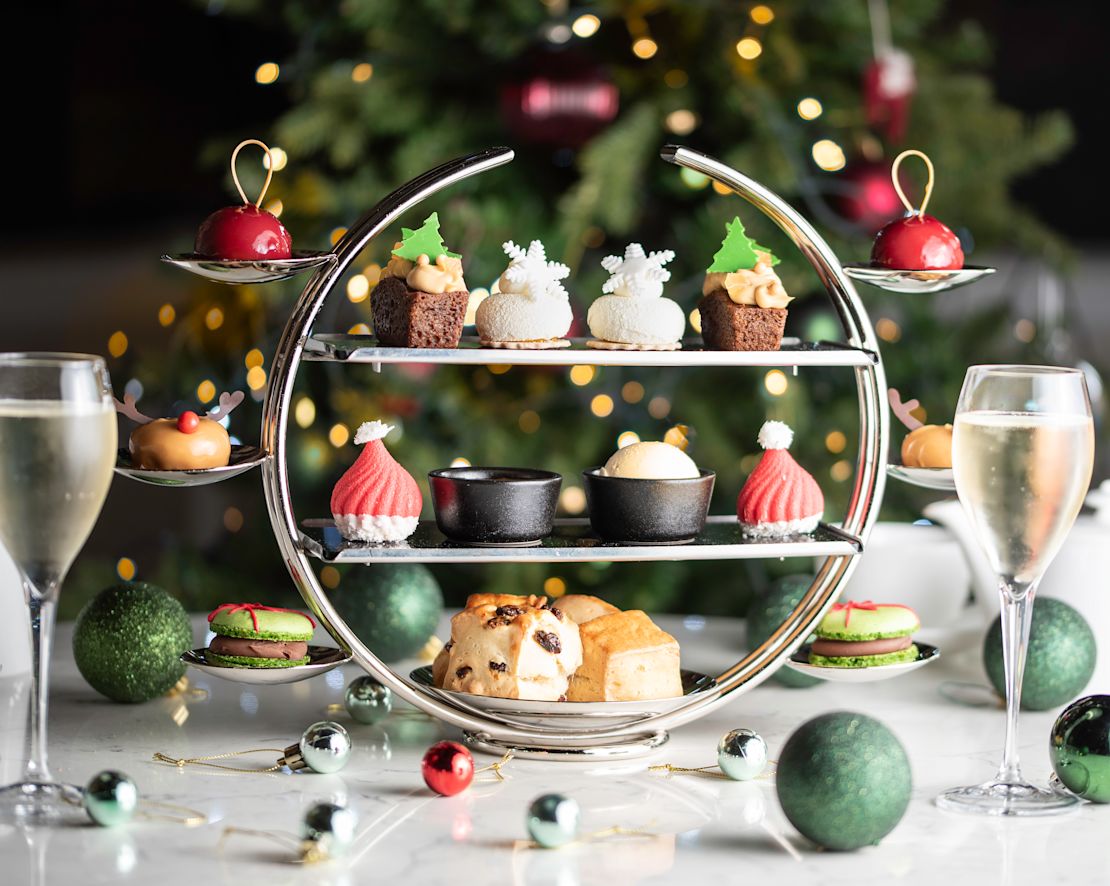 table set with sweets, champaigne and christmas decorations-transition