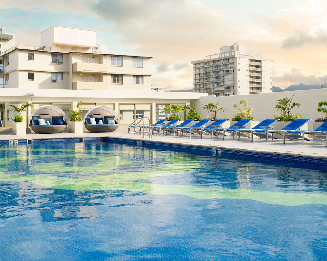 outdoor pool, day beds, lounge chairs-transition