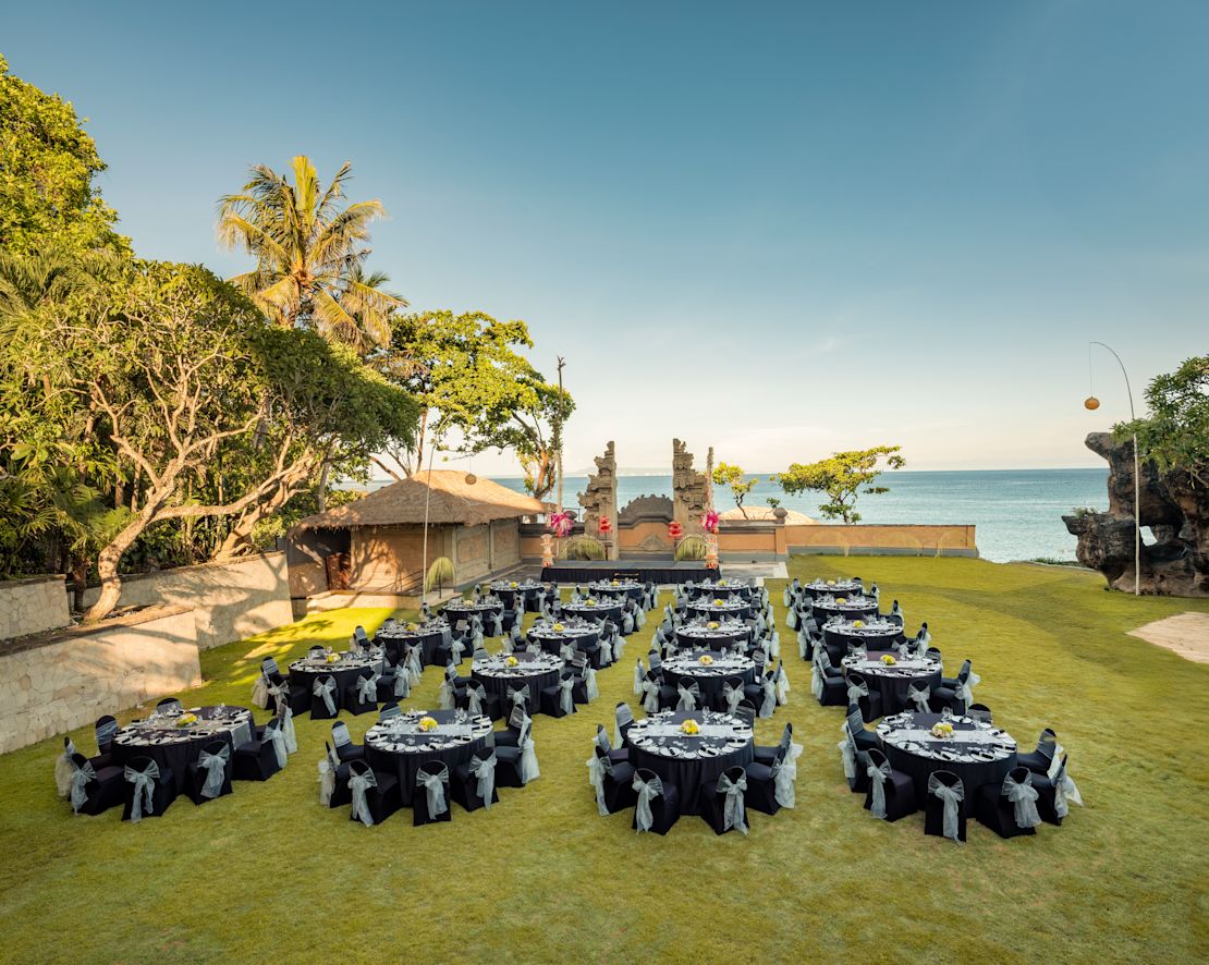 Outdoor seating area with tables and chairs, with sea view-transition