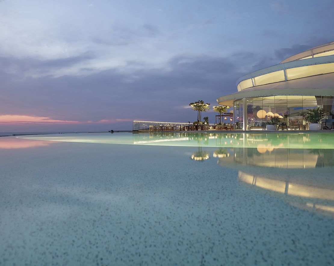 Infinity Pool at Dusk from Restaurant-transition