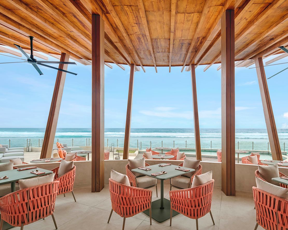 Uma Beach House Covered Exterior Dining Area with Beach View-transition