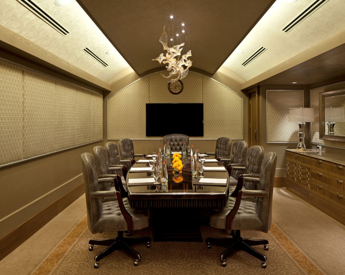 Meeting Room with Large Conference Table, Executive Chairs, and Domed Ceiling-transition