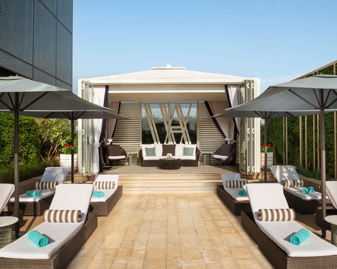 Cabana and Lounge Chairs in Pool Area-transition