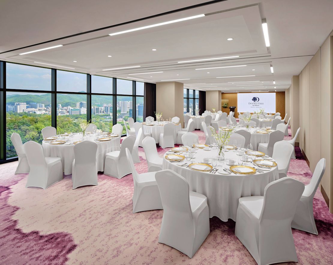 Round Tables in a Meeting Room with Panoramic Views of the City-transition