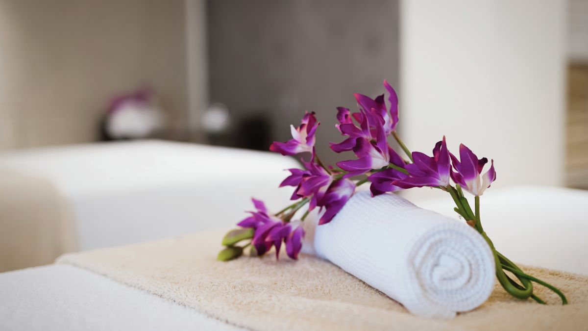 Massage room in spa resort with flower