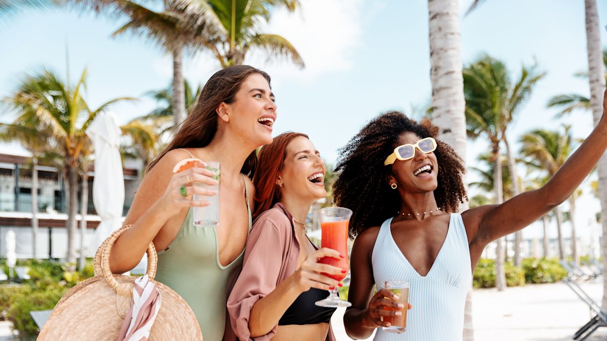 Friends having a selfie on the beach