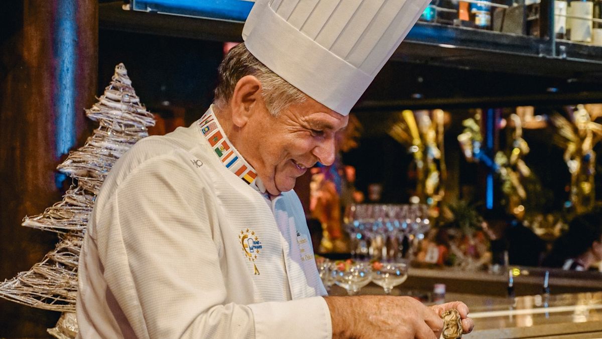 Chef Marcel Lessoile Prepareing Oysters in a Restaurant