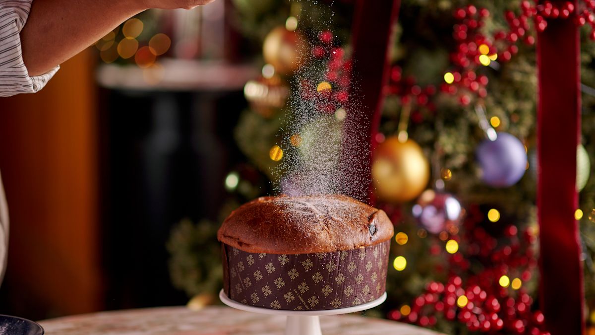 chocolate cake with christmas tree in background