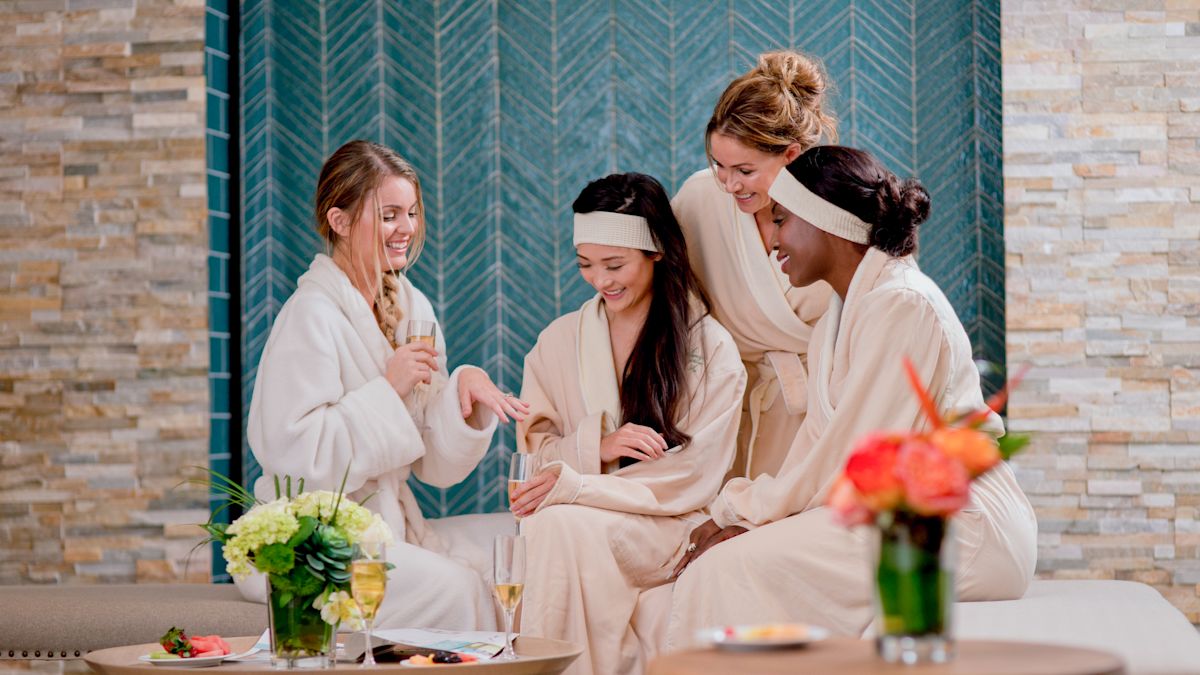 Women receiving spa treatment