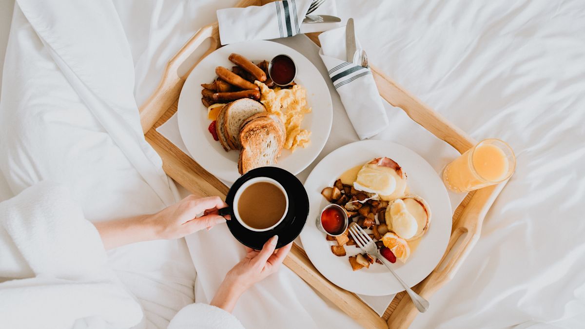 Woman Dining in the Guest Room
