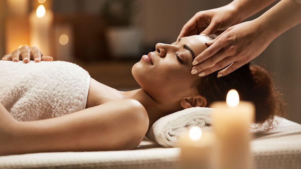 Woman receiving spa massage