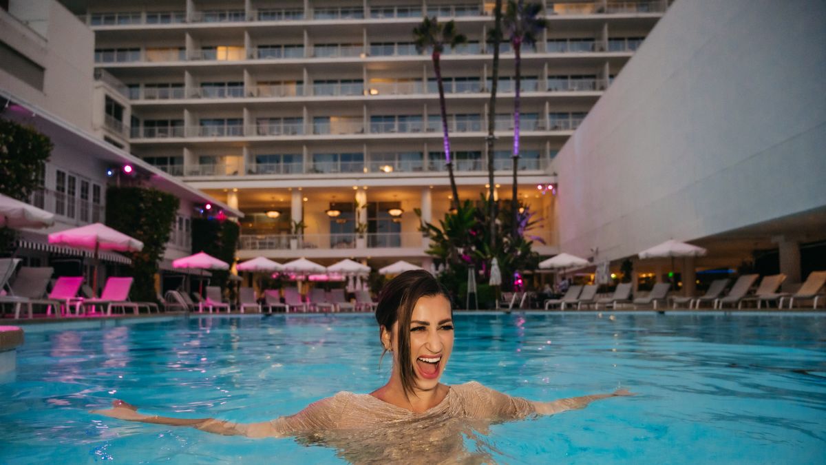 Woman laughing in pool
