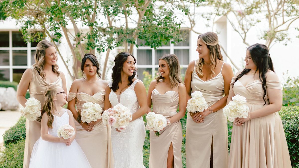 Bride with Bridesmaids Posing on Her Wedding Day