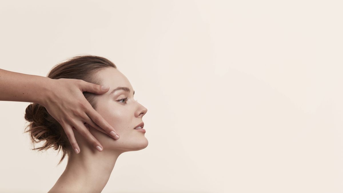Woman receiving head massage