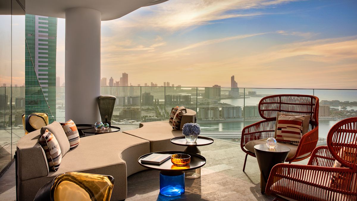 guest suite balcony, sofa, chairs, view of the city and water