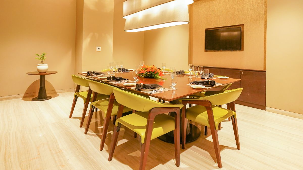 Table setup with green chairs