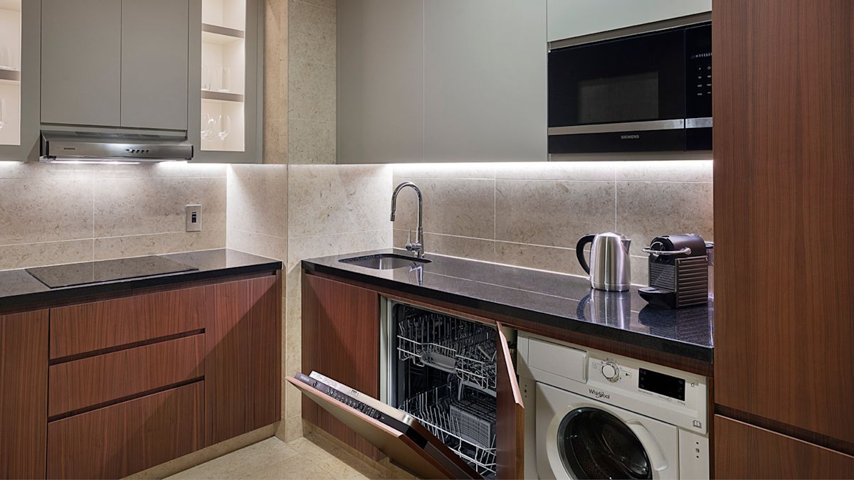 Kitchen area in room with microwave