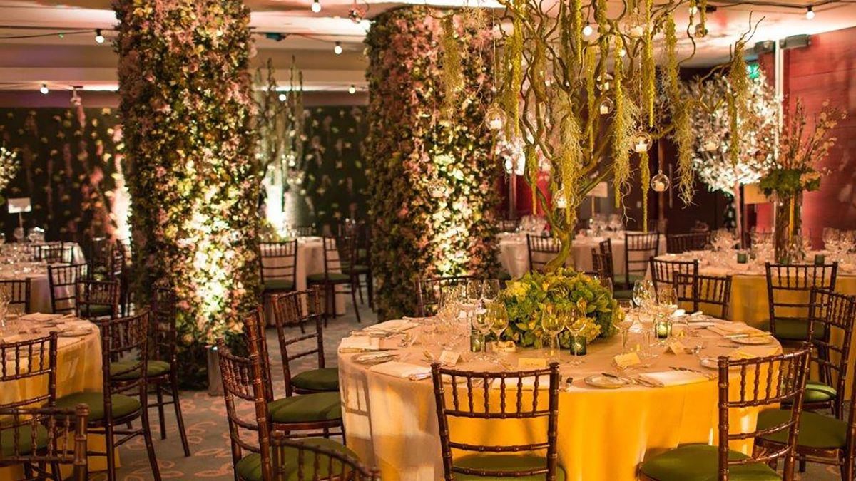 Ballroom setup for wedding reception with round tables
