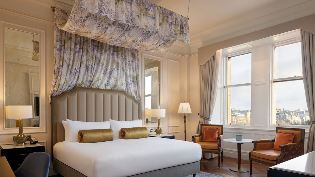 Large Bed in a Guest Room with Sitting Area