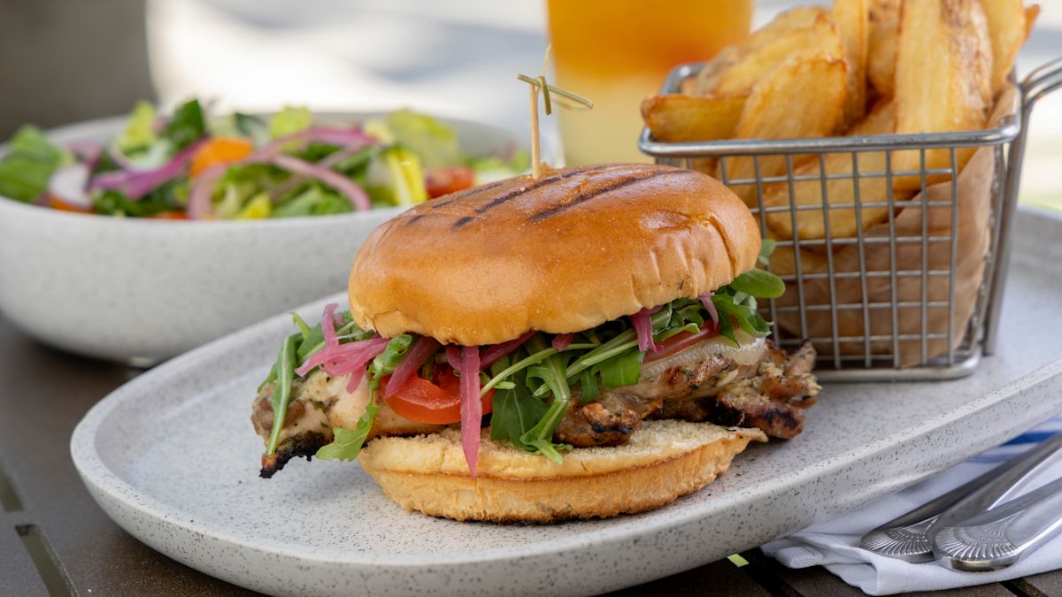 Pool bar, fish sandwich plate, fries, salad, iced tea