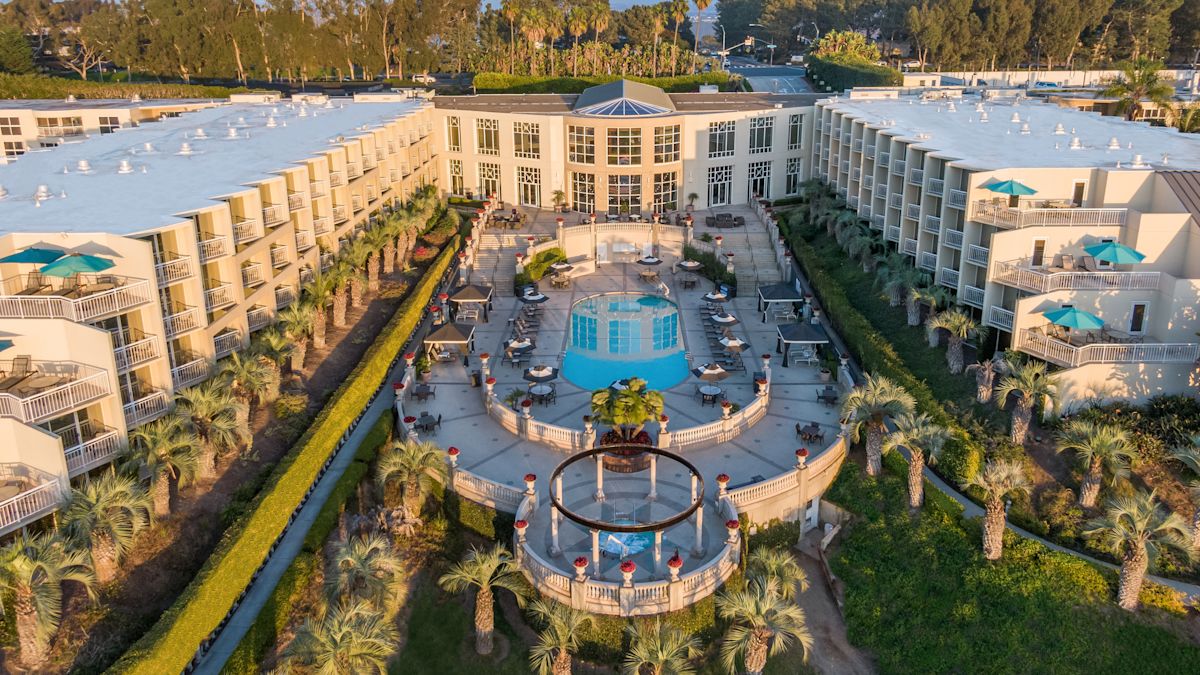 Aerial View of Outdoor Pool and Hotel Exterior