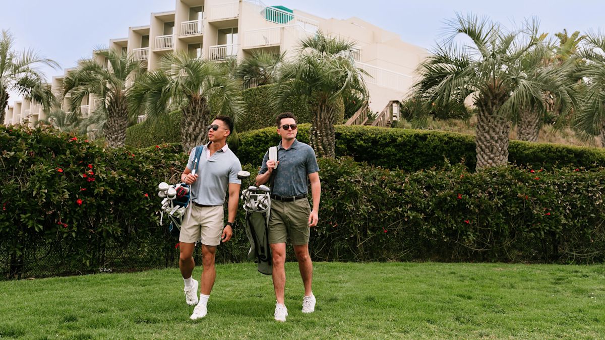 Two guests golfing