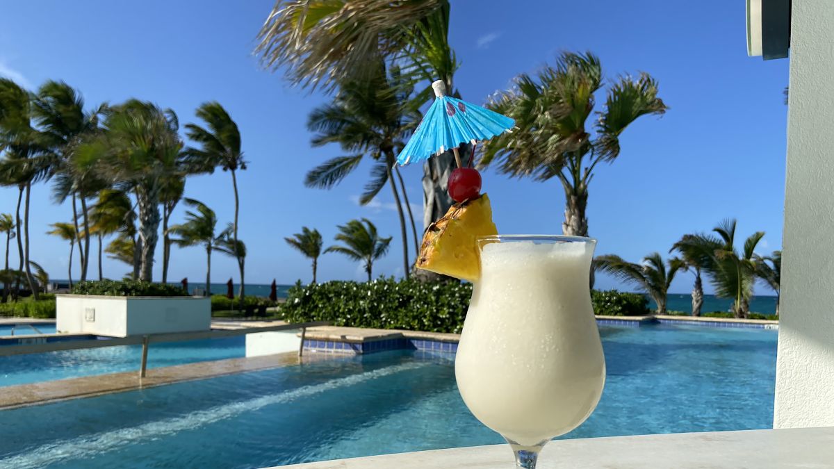 Pina Colada cocktail by the pool