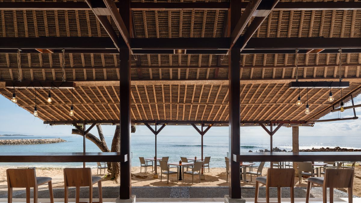 Outdoor seating area with tables and chairs