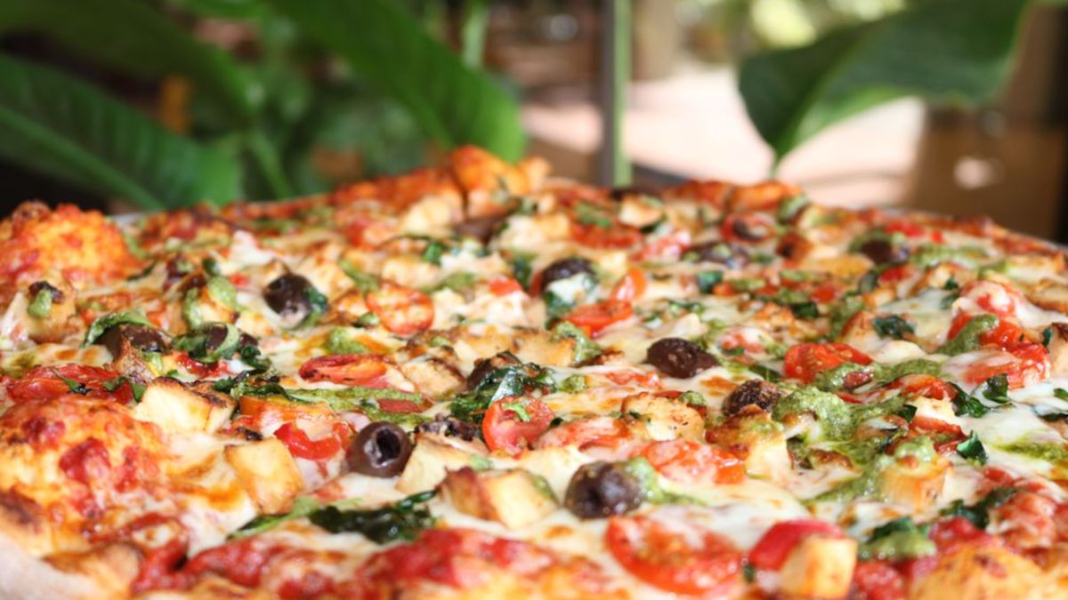 Close View of a Pizza from Albertos Pizzeria, The Market