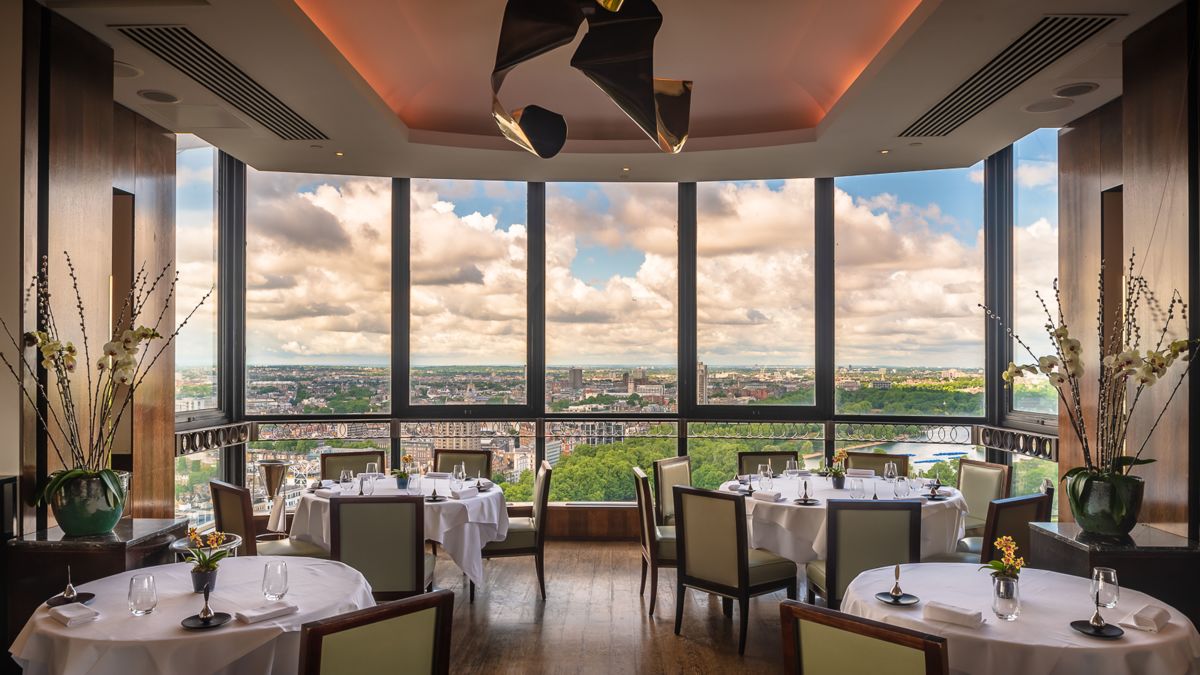 Galvin at Windows restaurant dining room, window view of the city