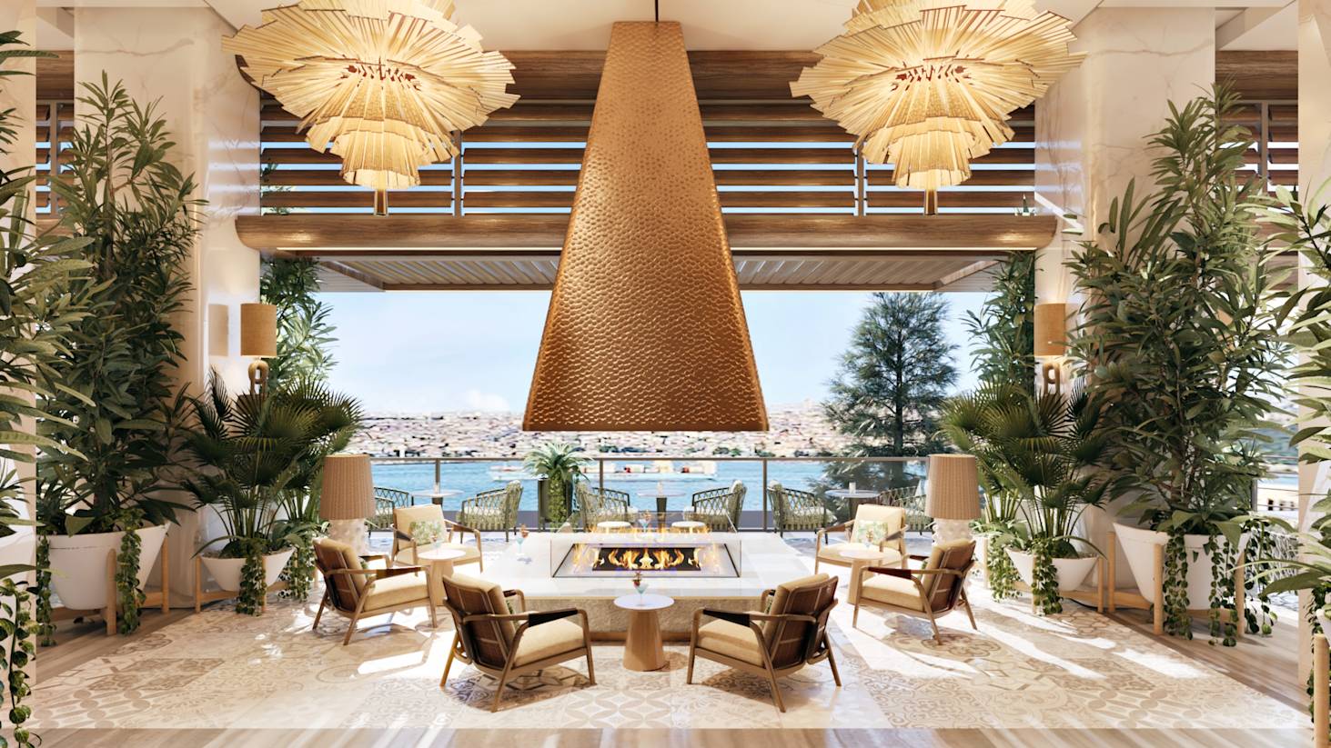 Terrace Restaurant with Fancy Chandeliers, a Fire Pit, and View of the Water