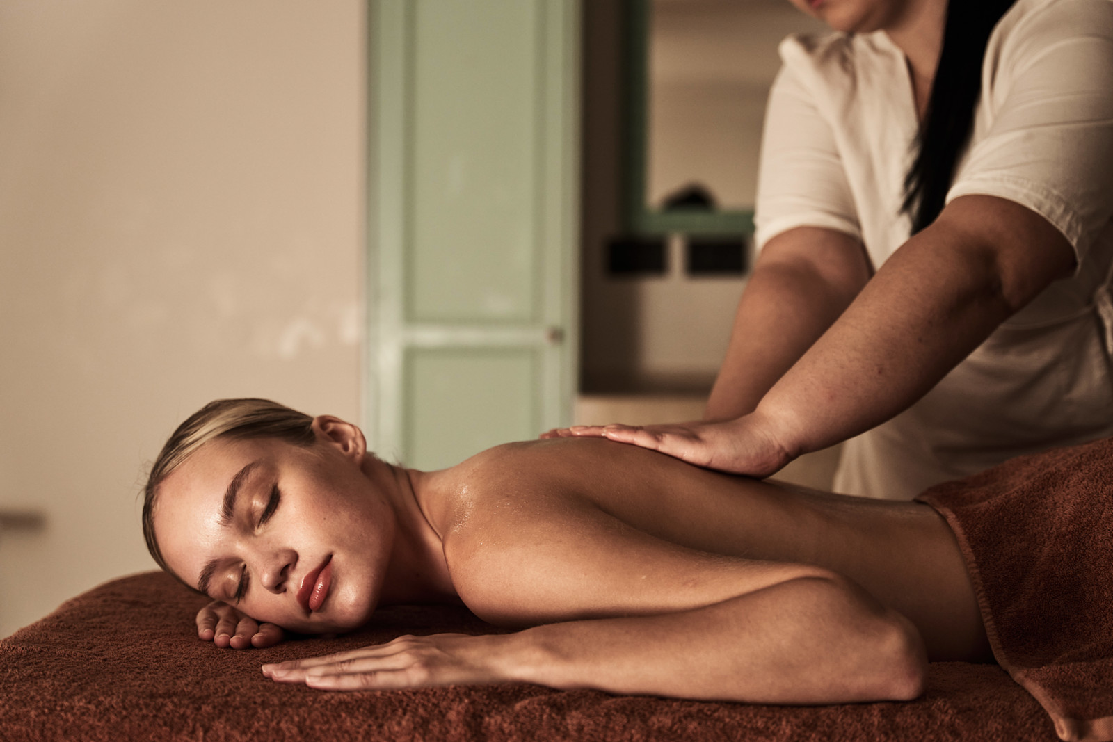 Woman Getting a Massage at the Spa