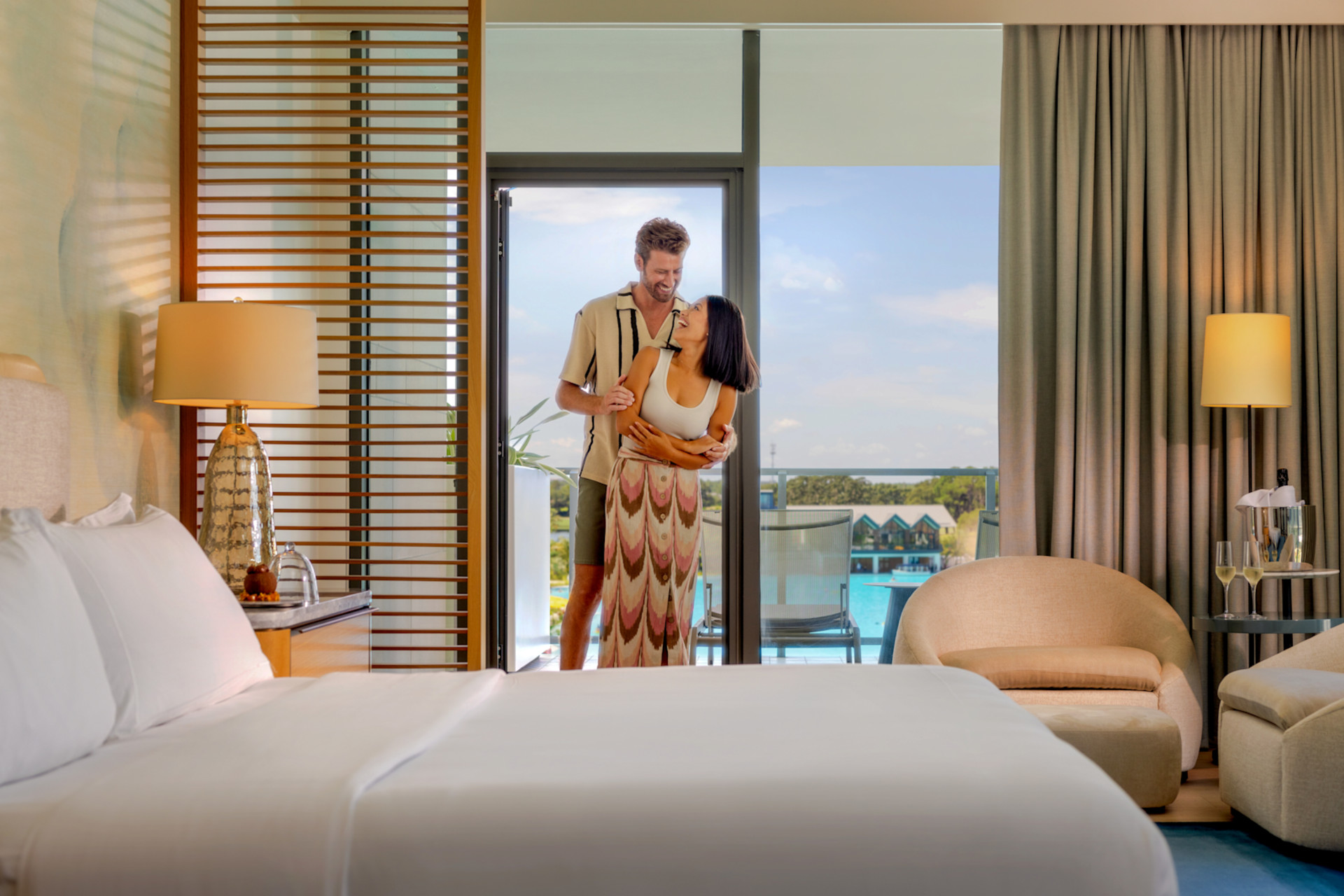 guests in a guest room, window view of the pool