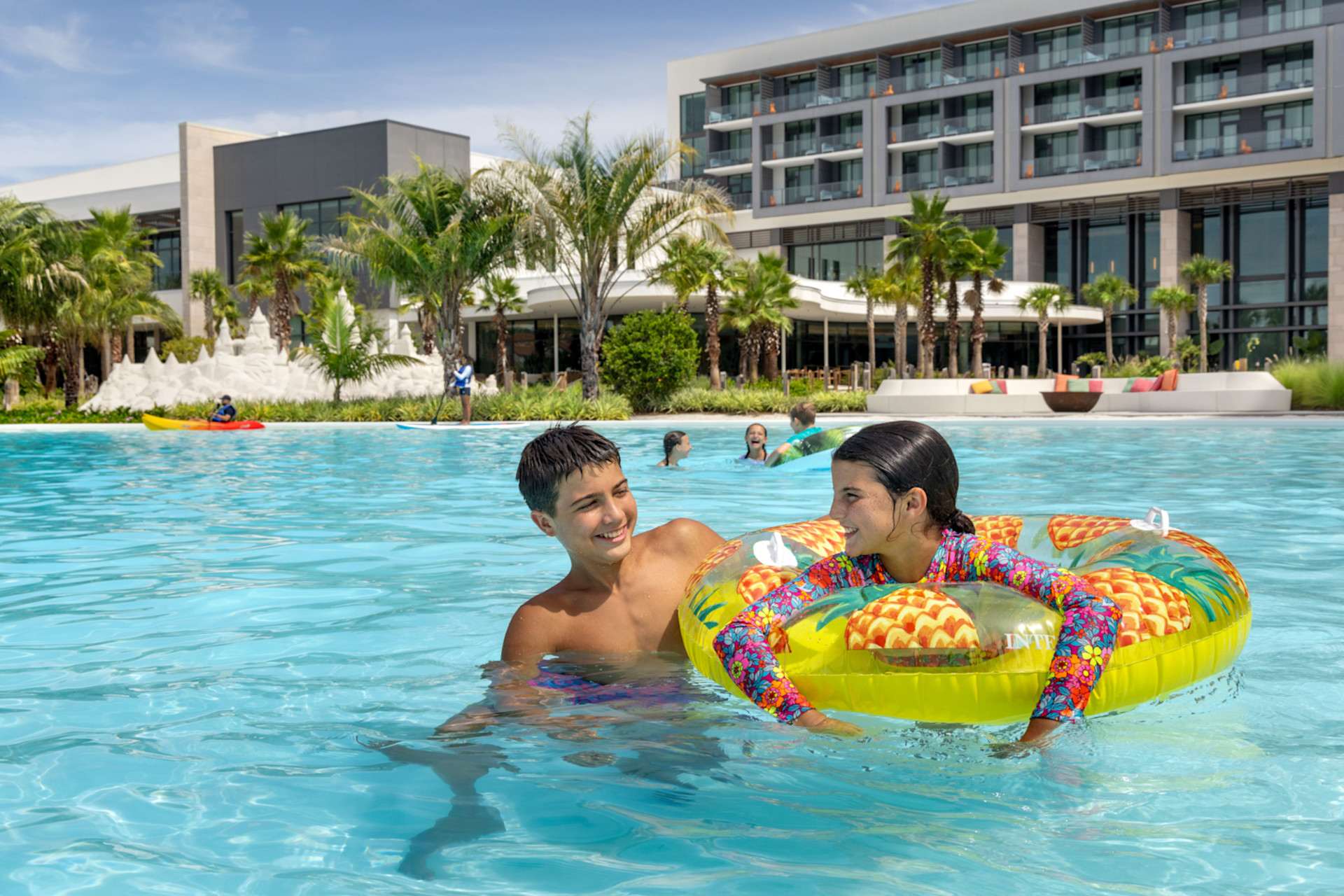 guests swimming in the outdoor pool