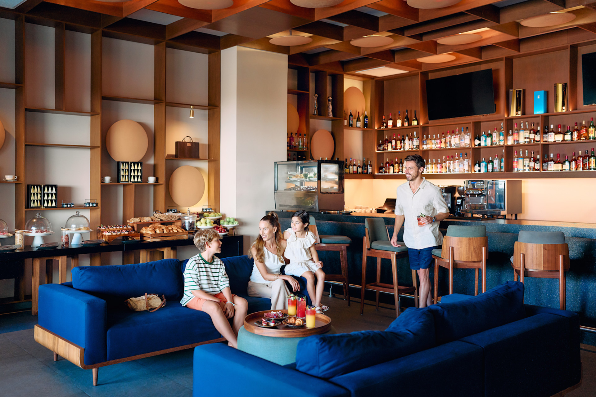 Family hanging out at the Enclave Lounge.