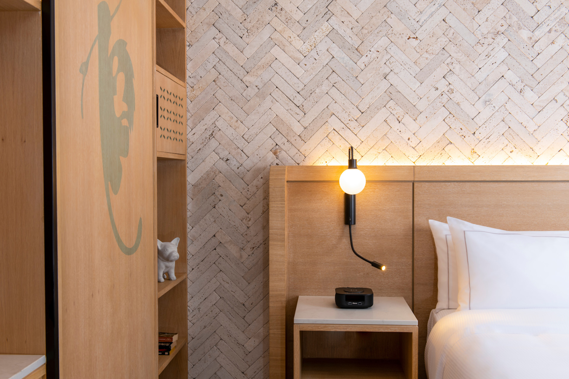 Bed and Nightstand Detail in a Guest Room